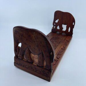 hand carved wooden elephant expandable book holder intricate floral design